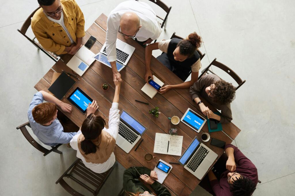 group of people with laptops